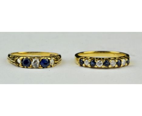 Two sapphire and diamond rings, one antique ring set with two round cut sapphires and two rose cut diamonds, with carved unde