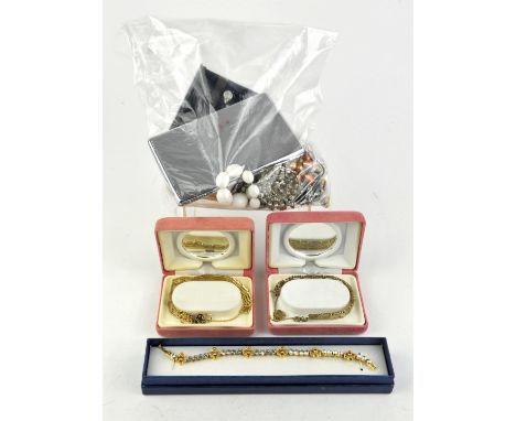 A collection of costume jewellery including including a pair of Swarovski drop earrings, two Pierre Cardin gate bracelets, a 