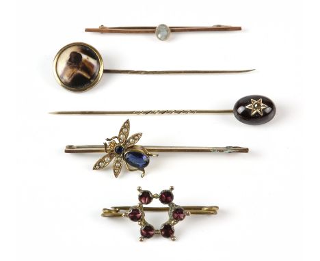 A selection of stick pins and brooches, including a Victorian garnet and rose cut diamond stick pin in 9 ct, an Edwardian ena