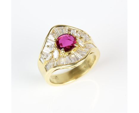 Diamond and ruby ring, with central cushion cut ruby weighing an estimated 0.55 carats, with a two rows of tapered baguette c