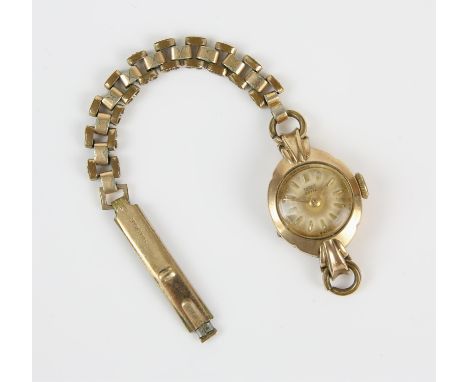 A ladies Tudor wristwatch, circular dial with baton hour markers, manual wind, 21 jewel Tudor movement, in a 9 ct gold case, 