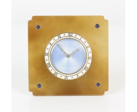 Cartier, an agate plaque and enamel travel clock, the guilloche bleu celeste dial set within chapter ring with Roman numeral 