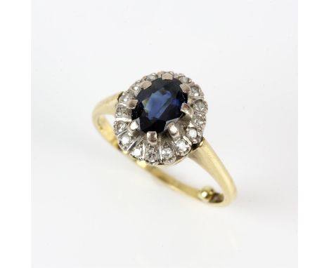 Sapphire and diamond ring, central oval cut sapphire weighing an estimated 1.18 carats, with a halo of single cut diamonds, i