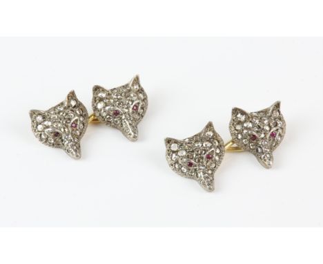 Fox head cufflinks, fox heads set with rose cut diamonds and ruby eyes, mounted in gold testing as 18 ctCondition Report:  Gr
