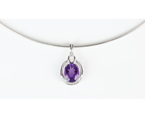 Amethyst and diamond pendant necklace, oval cut amethyst weighing an estimated 2.37 carats, with diamonds set to the bottom o