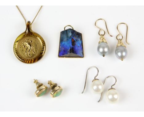 A collection of jewellery including a boulder opal pendant, mounted in gold testing as 18 ct, a glass pendant on a 9 ct chain