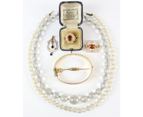 A collection of Edwardian jewellery including two rock crystal necklaces with faceted beads, both 42cm in length, one set wit