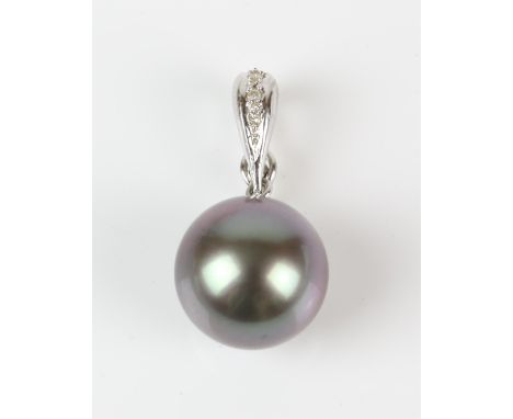 Tahitian pearl pendant, 12.3mm pearl with a 18 ct white gold clip bale set with round brilliant diamondsCondition Report:  Gr