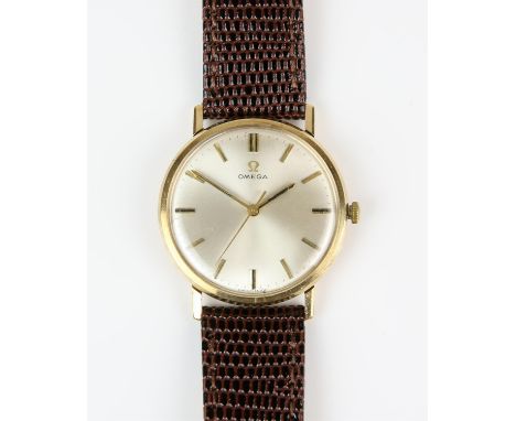 Omega, a Gentleman's gold wristwatch, the silvered dial with gilt baton hour markers and centre seconds, fitted with a manual