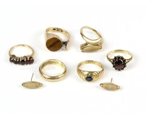 A sapphire and diamond set bombe ring, in 18 ct, size N, together with five 14ct rings including one set with tigers eye, one