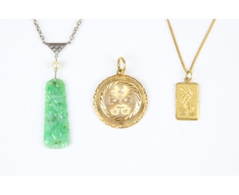 Two necklaces, one a fine curb link chain, with two pendants, one rectangular with a dragon motif, one a circular pendant wit