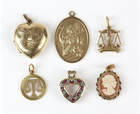 A collection of 9 ct pendants, including a ruby and diamond set heart pendant, two Libra scales pendants, a cameo pendant, a 