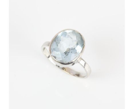 Single stone topaz ring, with a oval cut topaz weighing an estimated 5.47 carats, bezel set in white gold, size K, with certi