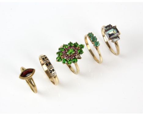 Five gem set rings, including a mystic topaz ring, size V, a sapphire and cubic zirconia ring, size V, a garnet ring, size P,