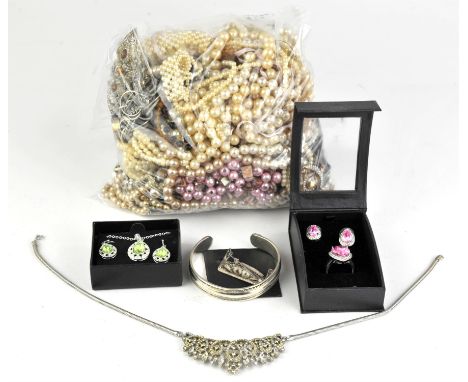 A collection of costume jewellery including mainly faux pearl necklaces, a silver cuff bangle, a marcasite ship brooch, a pas