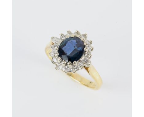 Sapphire and diamond cluster ring, with an oval cut sapphire weighing an estimated 1.90 carats, surrounded by mixed round cut