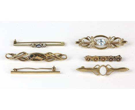 Six bar brooches, all in 9 ct, including an opal set brooch. a floral brooch, a sapphire and diamond brooch, and three others