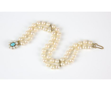 Two strand pearl bracelet, 7mm cream pearls individually knotted, 22cm in length, with a pearl and turquoise floral pearl cla
