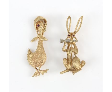 Two animal brooches, including a rabbit brooch, with ruby eyes, and a diamond set carrot, together with a duck brooch with a 