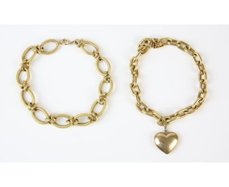 Two 18 ct bracelets, both stamped 750, including a fancy link bracelet with bolt ring clasp, 21cm in length, and another fanc