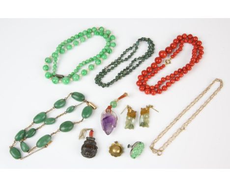 A collection of jewellery including a quartz and pearl necklace, 15 ct chain, carved amethyst pendant, coral bead necklace, a