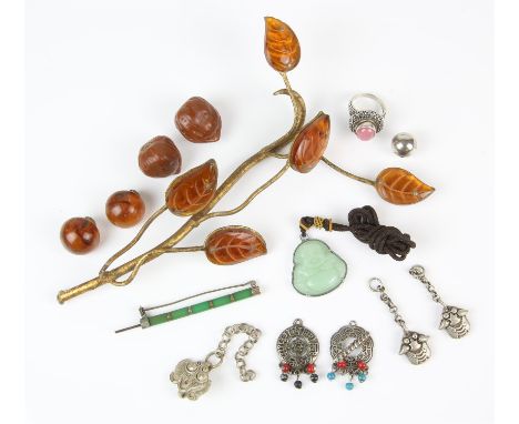 A group of items including a rose quartz silver ring, size P, a hardstone bar brooch, a three pendants, a pair of clip on ear