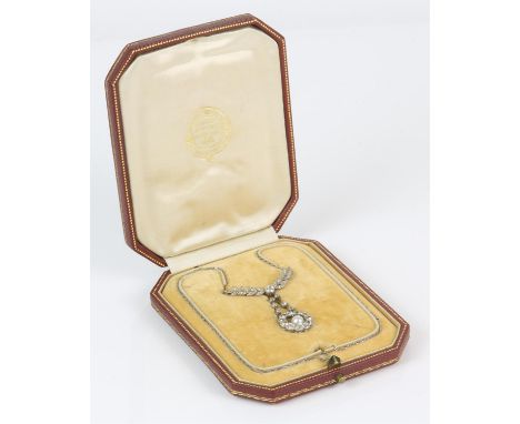 Fontenay France Belle Époque diamond and pearl set  pendant necklace. floral form open pendant millegain-set with old cut dia