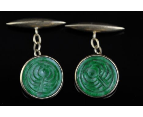 Two pairs of cufflinks, one set with mother of pearl and diamonds, bearing Russian marks for 14 ct, the other with jade stamp