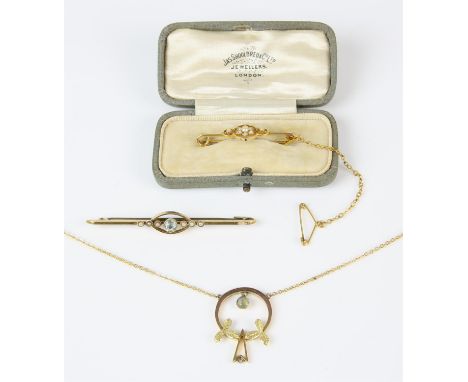 Two Edwardian bar brooches, including an aquamarine and seed pearl bar brooch and a seed pearl floral bar brooch, both in 15 