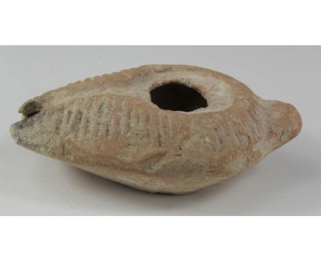 Ancient Roman decorated Oil Lamp , ca. 400 AD. Impressed floral/geometric decoration. Complete and in very good condition.  1