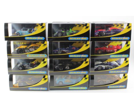 Scalextric. Twelve boxed Scalextric models, comprising Dallara Indy (C2516); Ford GT MKII (C2465); Minolta S Seater (C2096); 