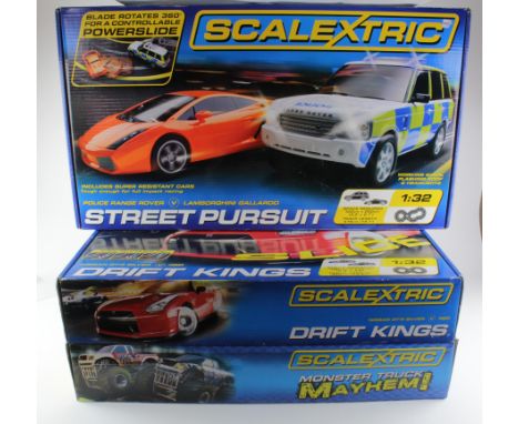 Scalextric. Three Scalextric boxed sets, comprising Street Pursuit; Monster Truck Mayhem!; Drift Kings (each look to be compl