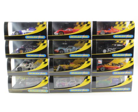 Scalextric. Twelve boxed Scalextric models, comprising Petrobras No3 (C2460); Ford Focus WRC (C2351); Dallara Indy (C2517); D