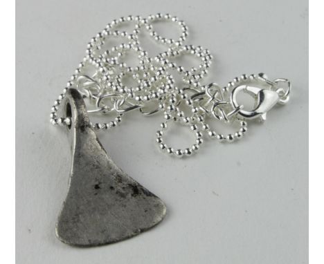 Viking Silver Axe Shape Pendant, ca. 900 AD, cast amulet shaped as battle axe with integal loop. Very fine, wearable conditio