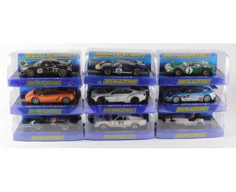 Scalextric. Nine boxed Scalextric models, comprising Ford GT40 (C3097); Ferrari 330 P4 (C3098); Caterham R500 (C3093); Ford M