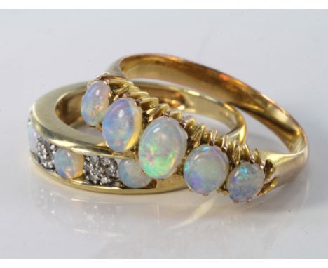 Two 9ct gold opal rings. 9ct yellow gold five stone opal ring, size L, weight 2.2g. 9ct yellow gold opal and diamond band rin