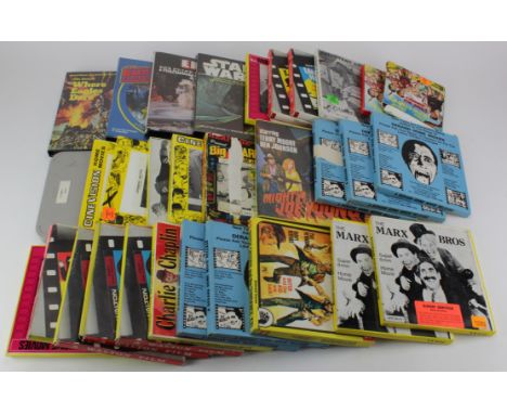 Super 8. A collection of approximately forty Super 8mm film reels, including Star Wars, Superman, Elvis, Laurel & Hardy, Mick