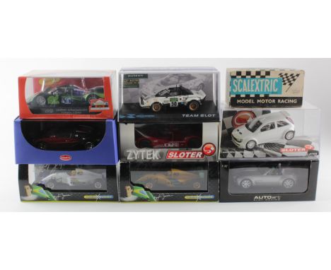 Slot Cars. Nine boxed slot car models, makers include Scalextric, Formula Senna, Slot.it, Sloter, Auto Art, Team Slot etc.