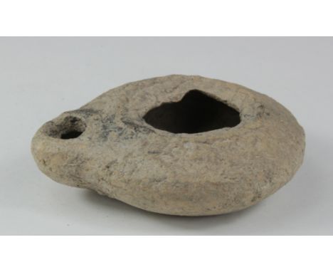 Ancient Roman decorated Oil Lamp , ca. 400 AD. Impressed floral/geometric decoration. Complete and in very good condition.  8
