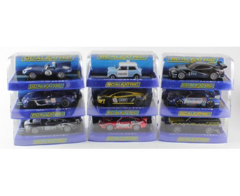 Scalextric. Nine boxed Scalextric models, comprising Jaguar XKR GT3 (C3131); Mini Police Car (C3213); Jaguar D-Type 1957 (C32