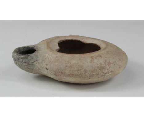 Ancient Roman decorated Oil Lamp , ca. 400 AD. Impressed floral/geometric decoration. Complete and in very good condition.  8