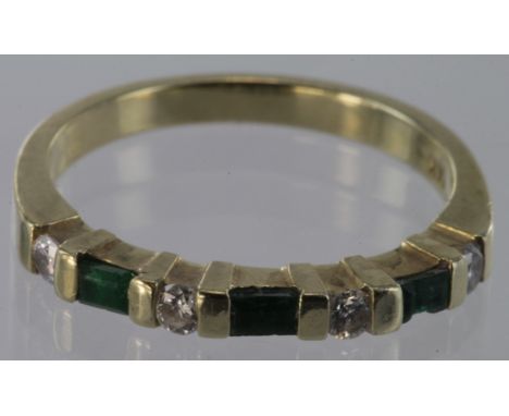 14ct yellow gold half eternity ring set with three baguette cut emeralds and four round brilliant cut diamonds, size K, weigh