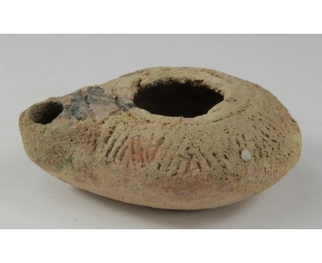 Ancient Roman decorated Oil Lamp , ca. 400 AD. Impressed floral/geometric decoration. Complete and in very good condition.  9