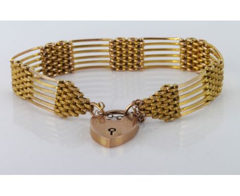 9ct gold six row gate link bracelet with heart padlock clasp and safety chain, weight 23.2g