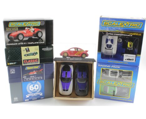Scalextric. Eight boxed Scalextric models, including 3 x Racing Packs (one missing box), Scalextric Sport, Superslot Legends 