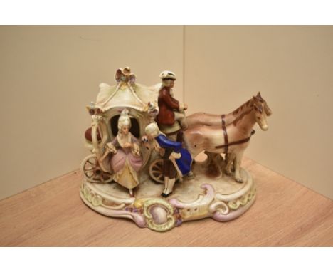 A vintage German porcelain figurine of a horse and carriage, having stamp to base.