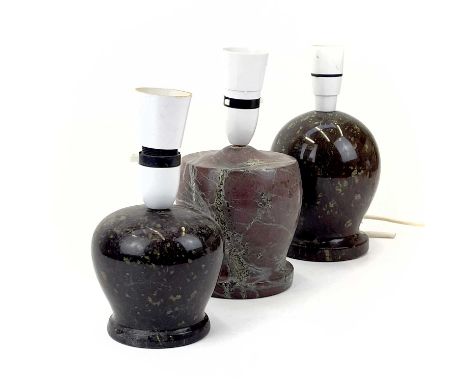 A Cornish Serpentine lamp base. Height 14.5cm, together with two Cornish Serpentine lamp bases. (3)