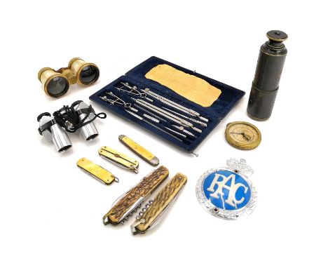 A German WWI black lacquered brass two draw telescope. Etched with 20 Malige Vergrosserung, together with a pair of Orion 8 x
