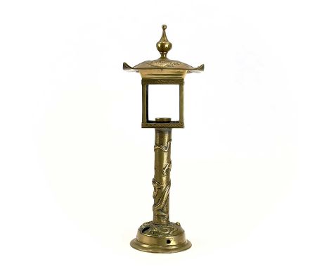 A Japanese brass lantern type table lamp. Cast with dragons and birds, height 44cm.