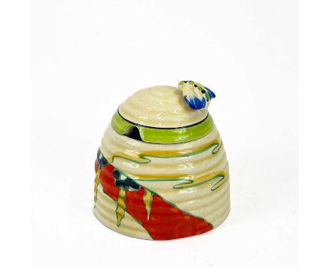 A Clarice Cliff Fantastique beehive honey pot and cover. Decorated in the solitude pattern with applied bee to the lid, print